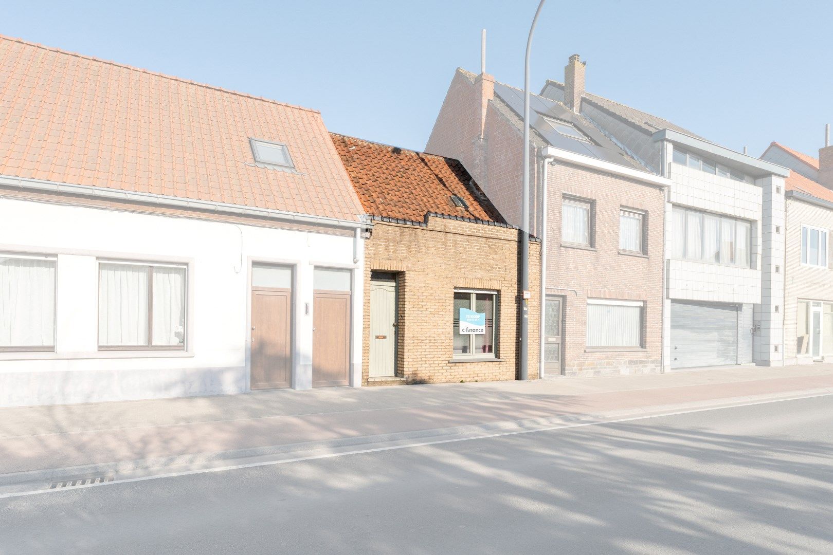 Volledig te renoveren stadswoning met zonnige tuin en tal van mogelijkheden op strategische ligging! foto 11