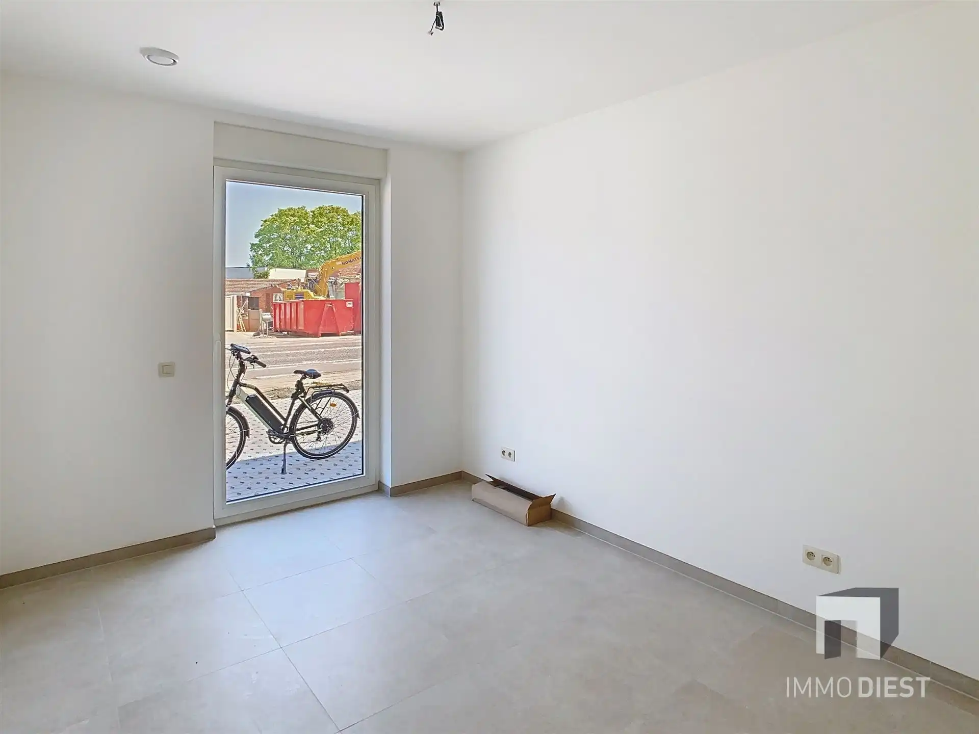 Gelijkvloers appartement met terras en tuintje foto 15