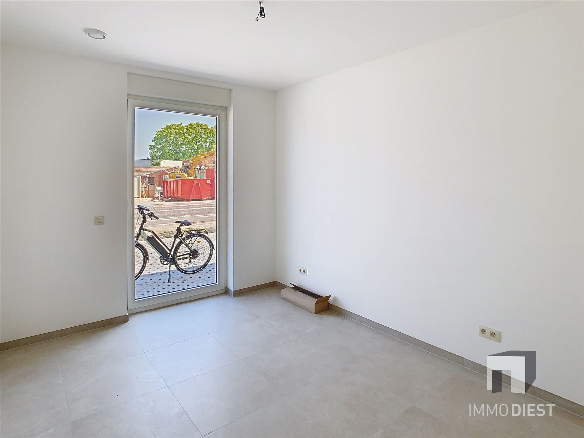 Gelijkvloers appartement met terras en tuintje foto 15