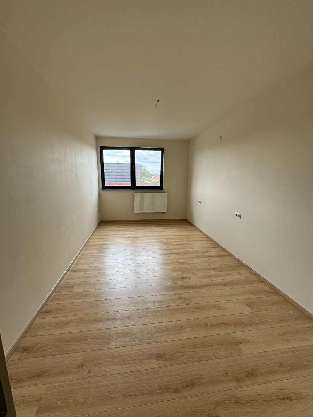 Duplex appartement met 3 slaapkamers en 2 autostaanplaatsen in hartje Beringen foto 12