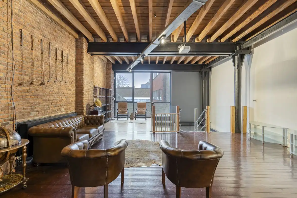 Industriële duplexloft met karakter in Gent foto 3