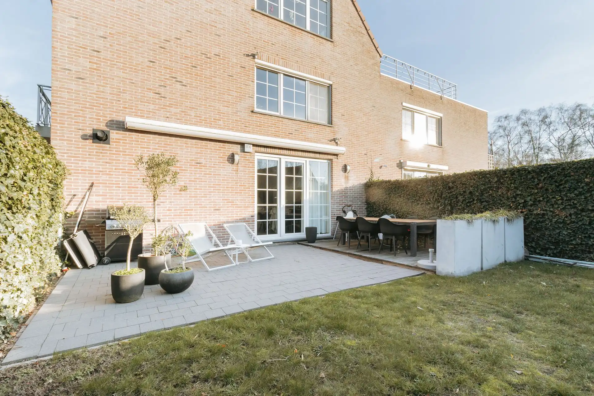 Instapklaar gelijkvloersappartement met tuin en garagebox foto 26