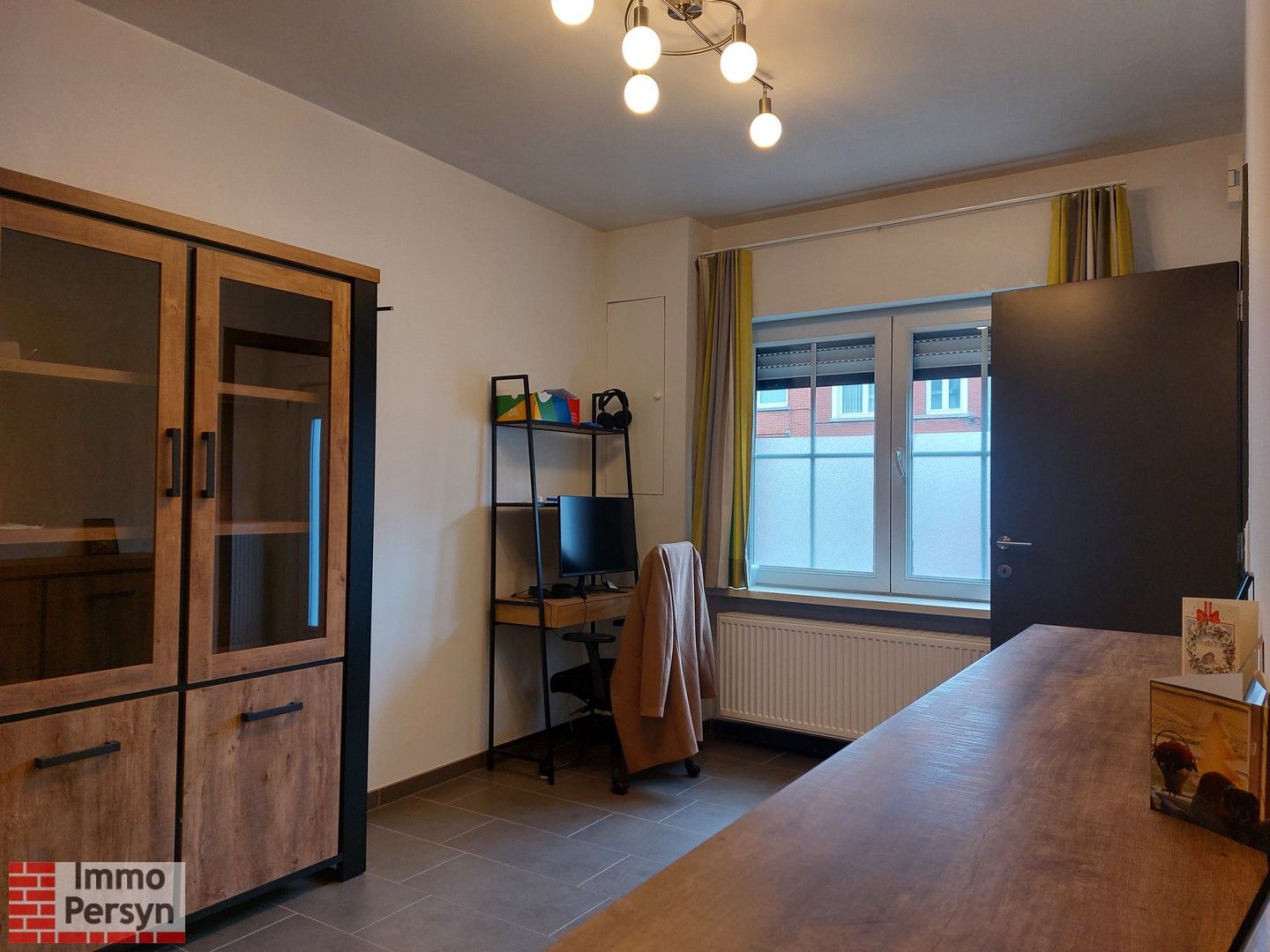 Gezellige rijwoning met kleine stadstuin foto 5