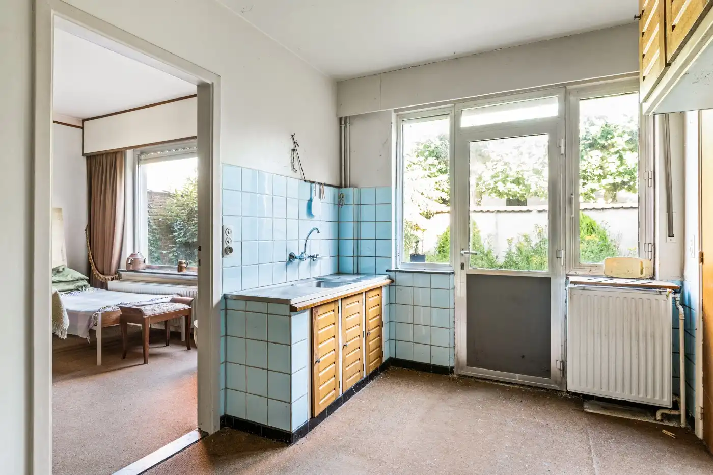 Te renoveren woning met 3 à 4 slpk., garage en tuintje foto 16