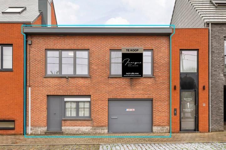 Instapklare woning met garage in hartje Putte – ideaal voor starters of investeerders foto {{pictureIndex}}