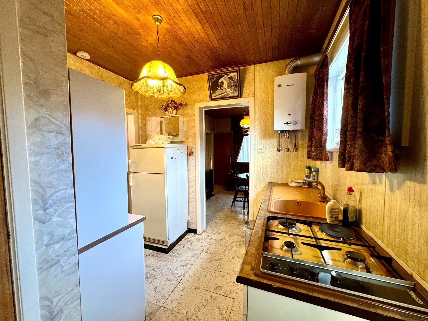 TE RENOVEREN WONING MET 4 SLPKS, TUIN EN DUBBELE GARAGE foto 12