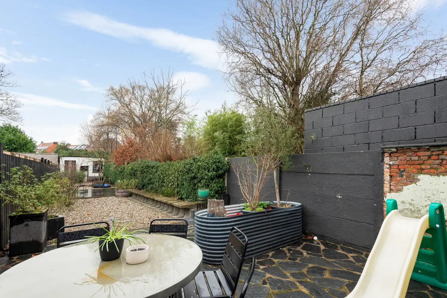 Charmant, gerenoveerd huis met 4 slaapkamers, 2 badkamers en gezellige tuin in Wijnegem! foto 14