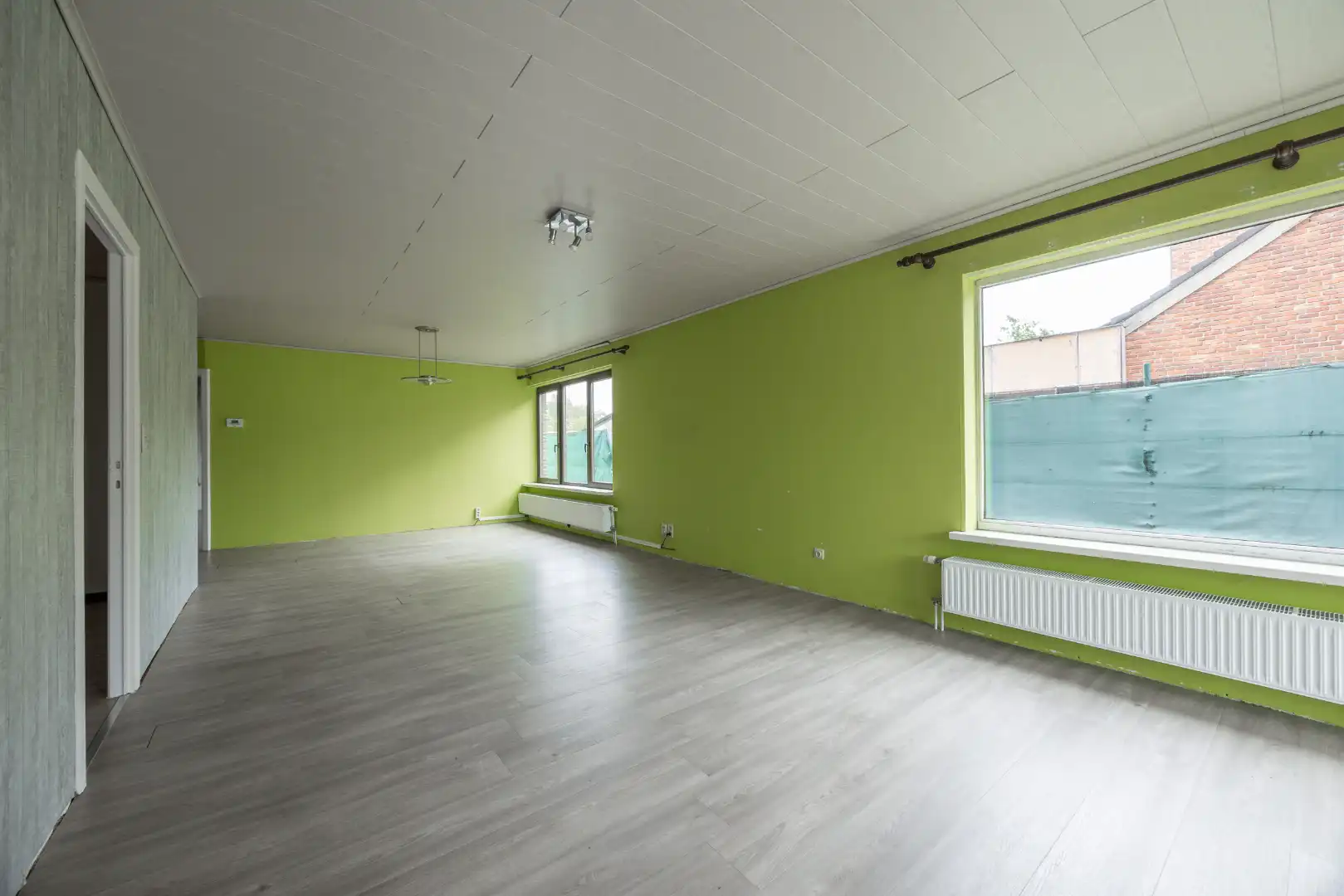 Ruim gelijkvloers appartement te koop! foto 3