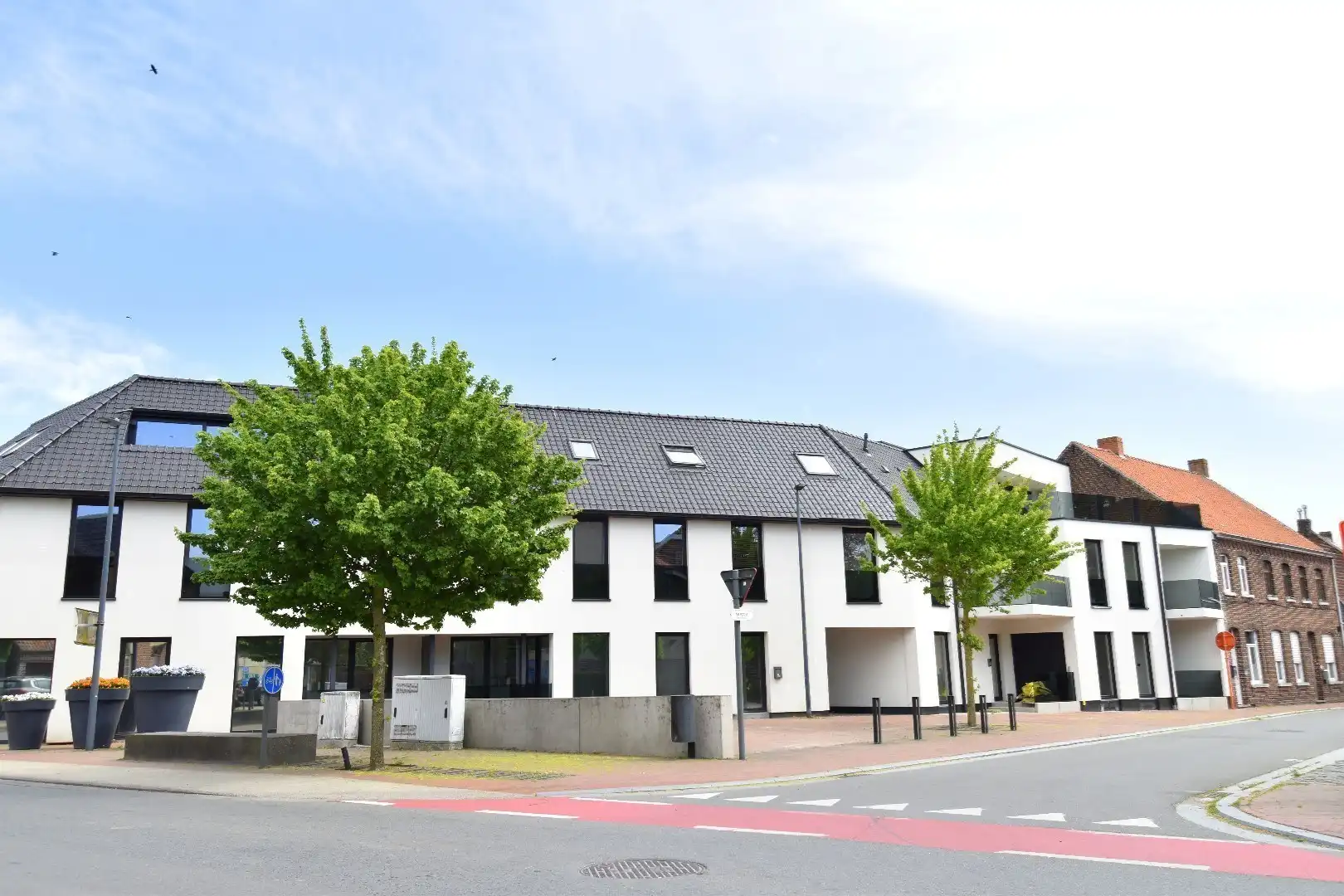 Penthouse te koop met 3 slaapkamers en ruim terras in Spiere-Helkijn foto {{pictureIndex}}