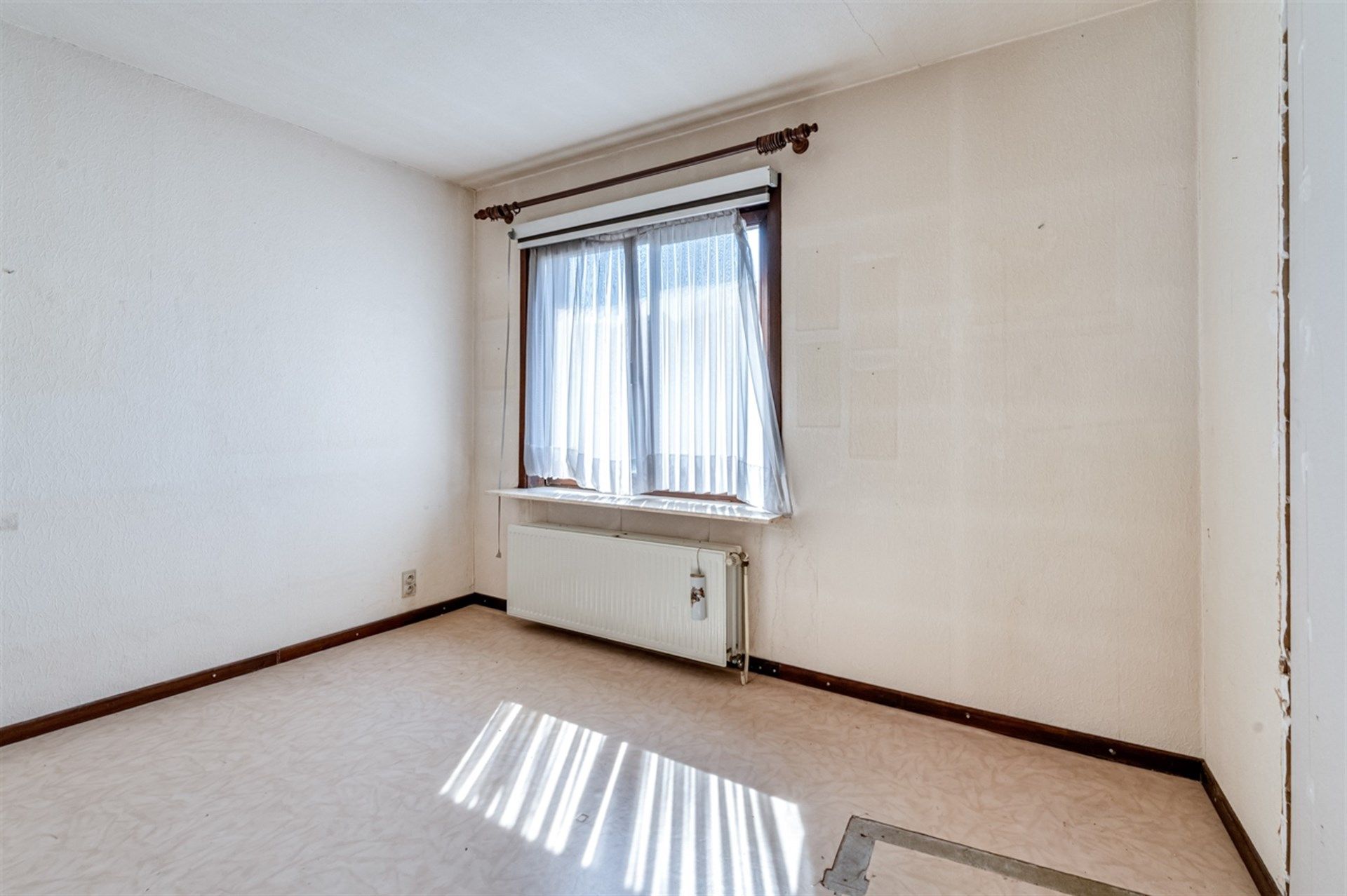 Knusse woning met twee slaapkamers en koer foto 10