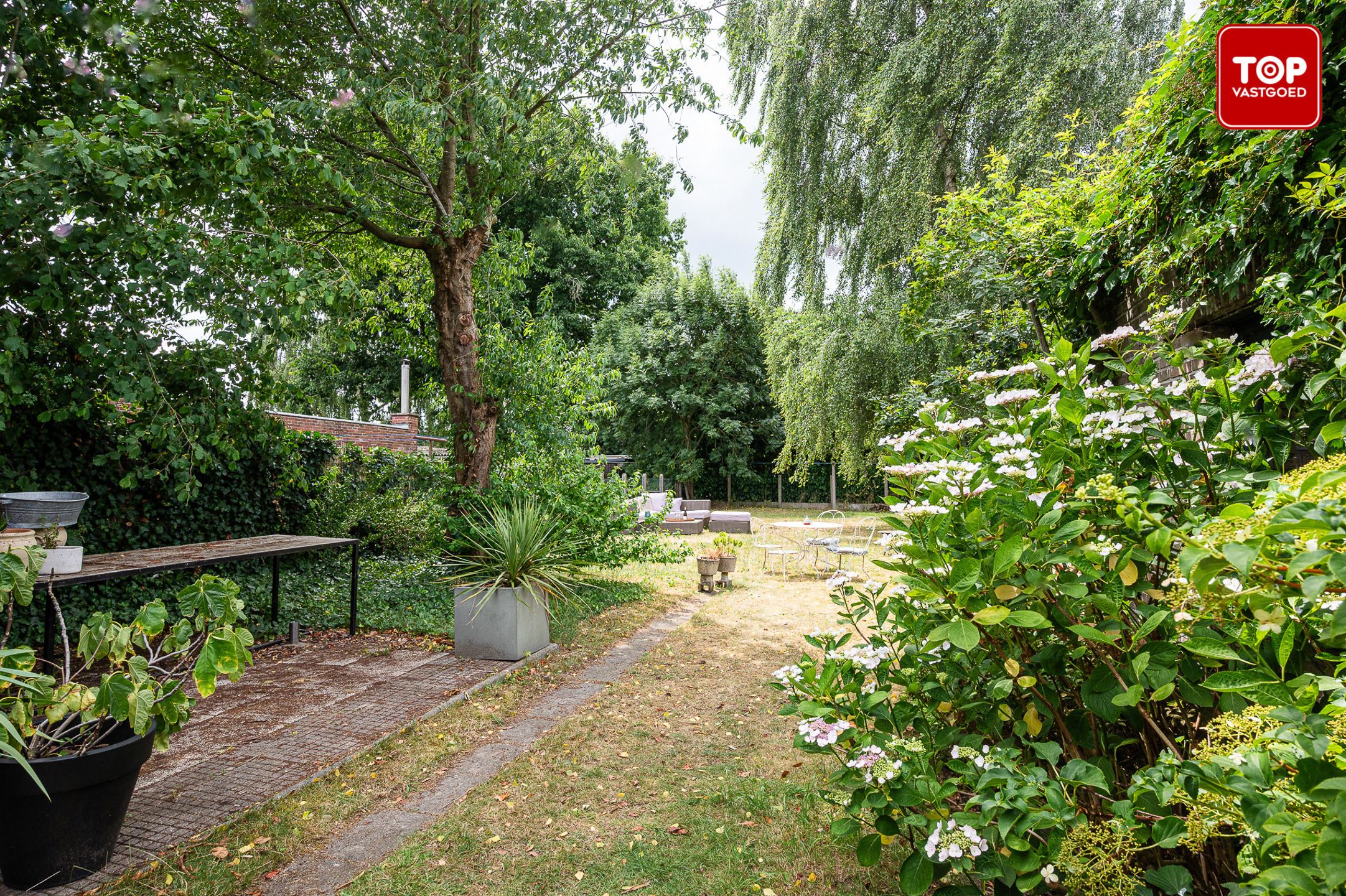 Gerenoveerde en lichtrijke gezinswoning met prachtige tuin foto 23