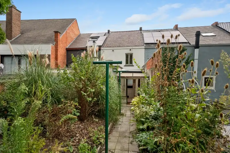 Te renoveren starterswoning met 2/3 slaapkamers en tuinjte foto 15