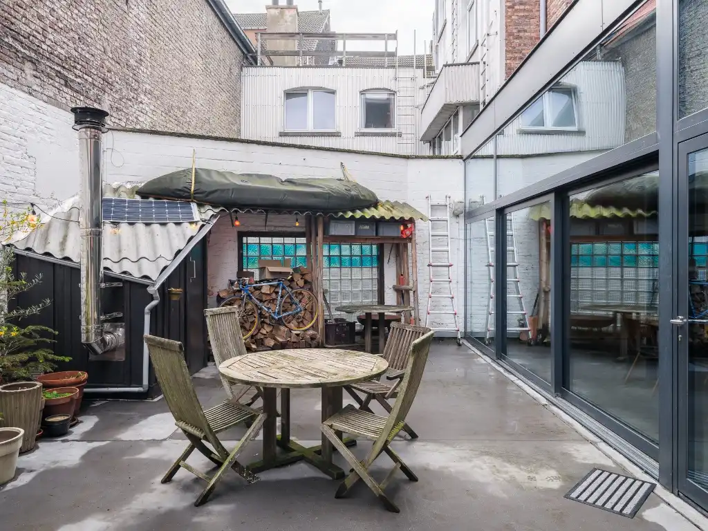 Bijzonder ruime duplex loft (263 m2&nbsp;bvo) met buitenruimte, 3 slaapkamers, 2 badkamers en inpandige garage nabij de Vrijdagsmarkt. foto 12