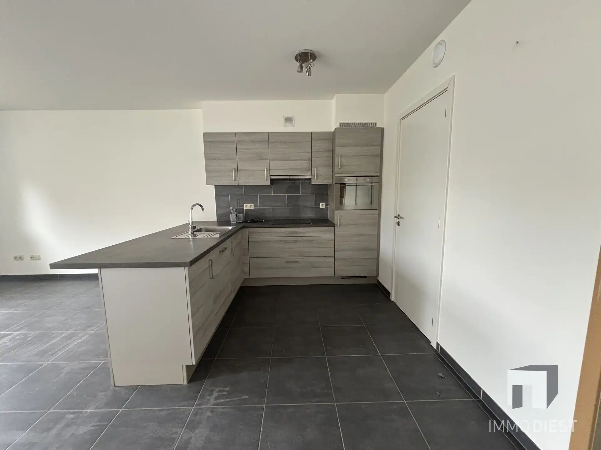 Energiezuinig appartement in centrum met kelder en garagebox foto 9