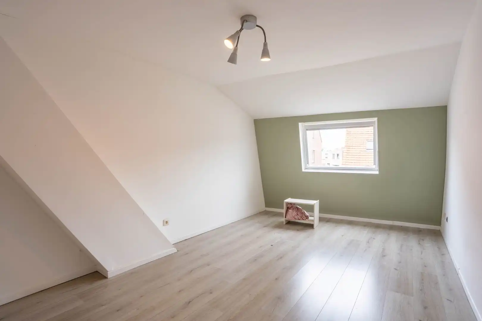 Een knusse rijwoning met tuintje en 3 slaapkamers, gelegen pal in het centrum van Maaseik. foto 16