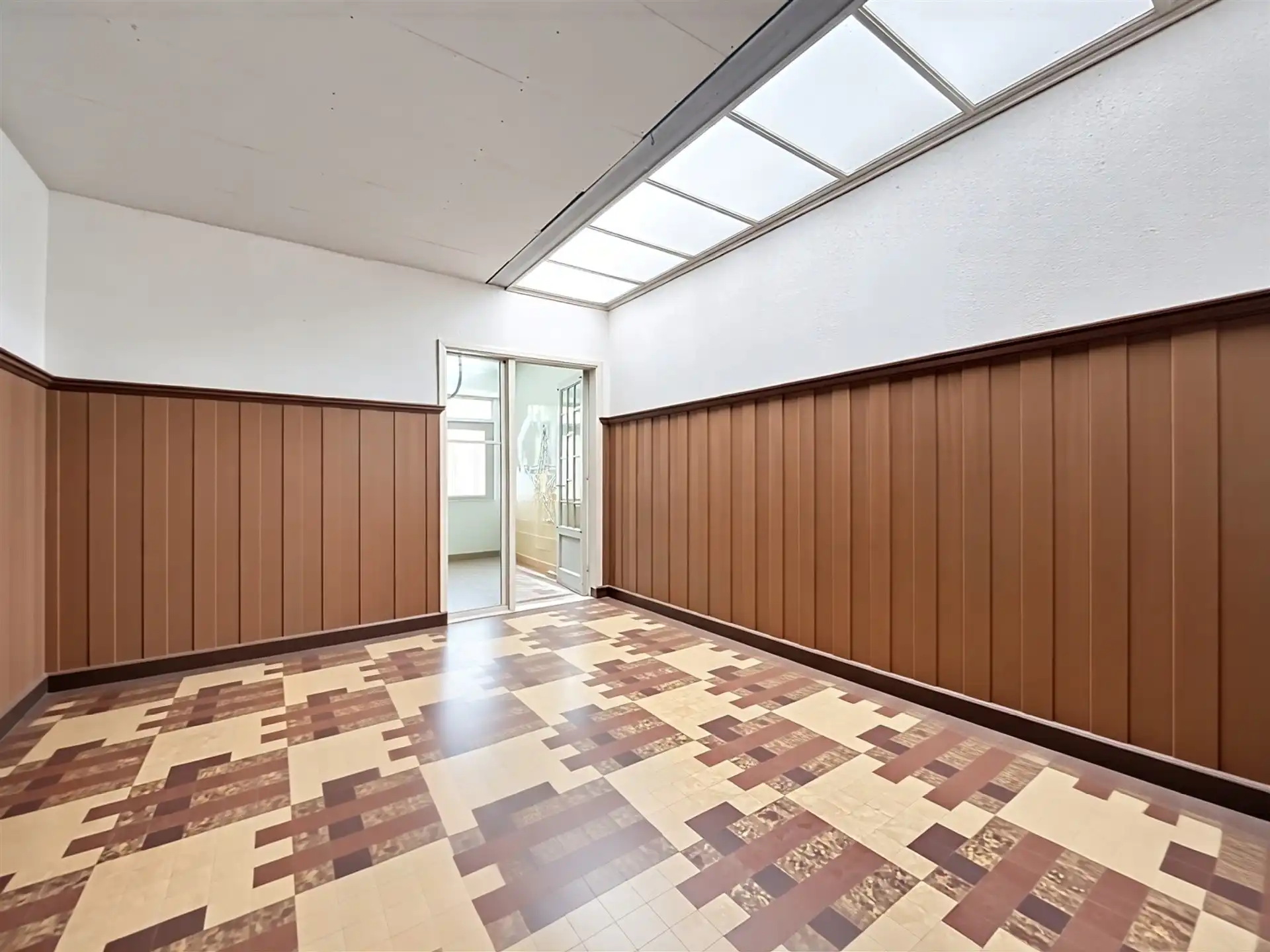 Opbrengsteigendom met 2 appartementen en een handelspand van 200 m² foto 12