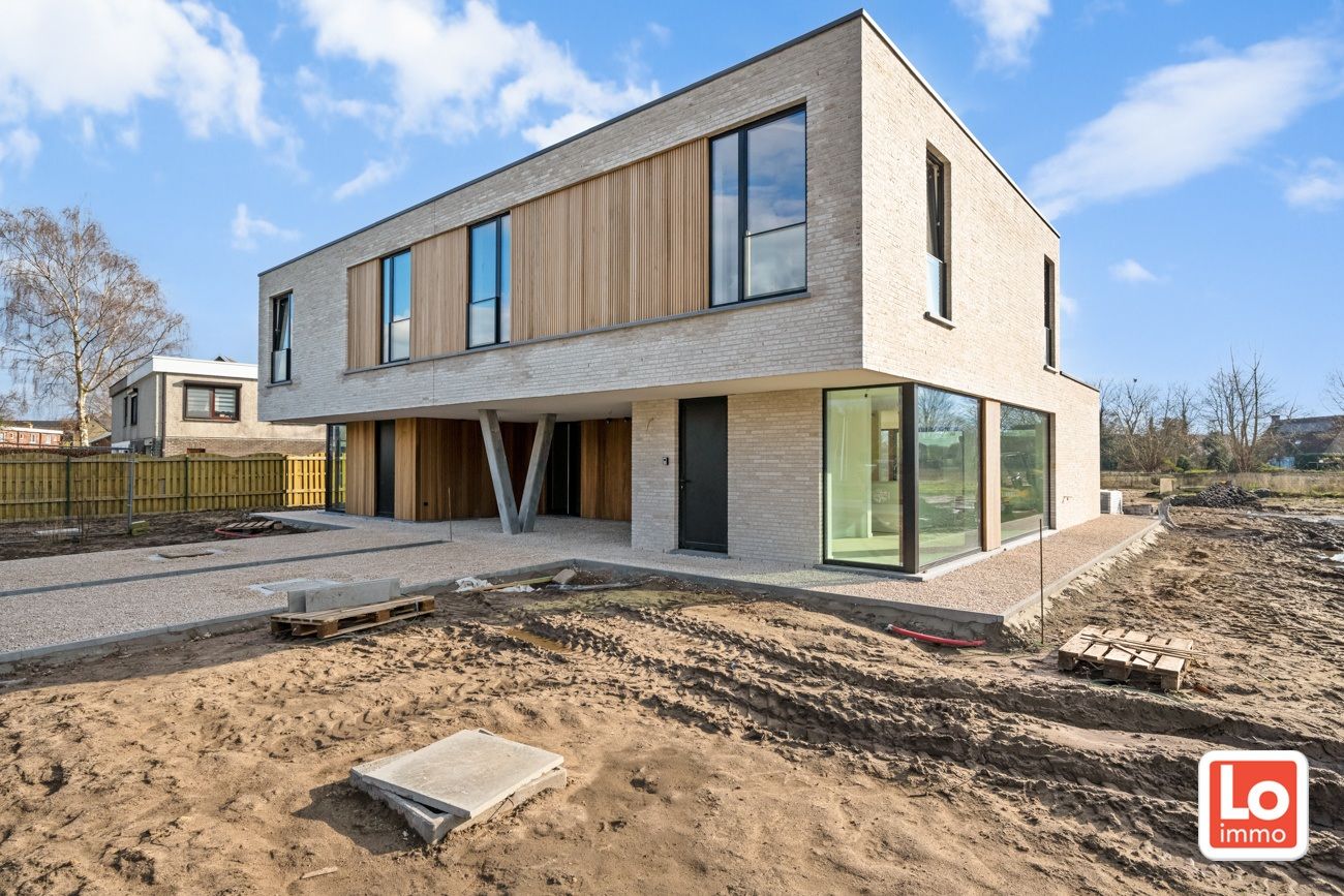 Moderne nieuwbouw in Destelbergen met prachtig zicht op velden achteraan foto {{pictureIndex}}