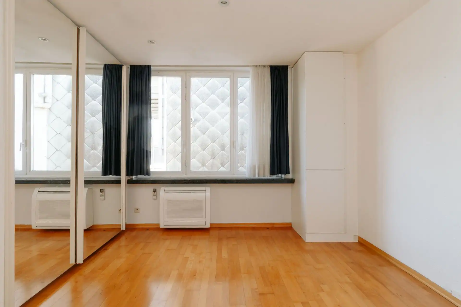 Zeer ruim 2-slaapkamerappartement in het centrum van Wilrijk foto 11