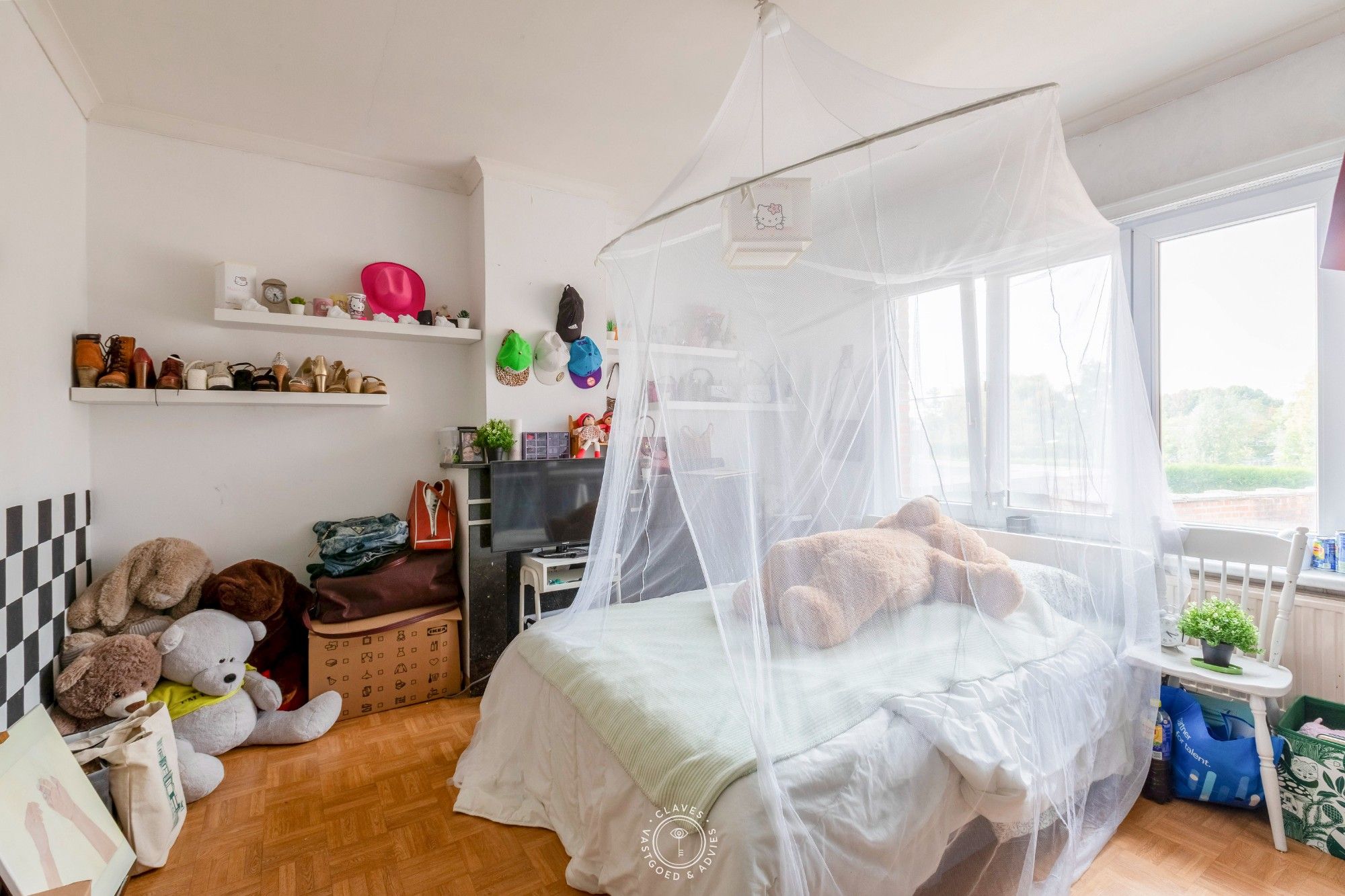 Ruime gezinswoning met fijne tuin en mogelijkheid tot vijf slaapkamers foto 18