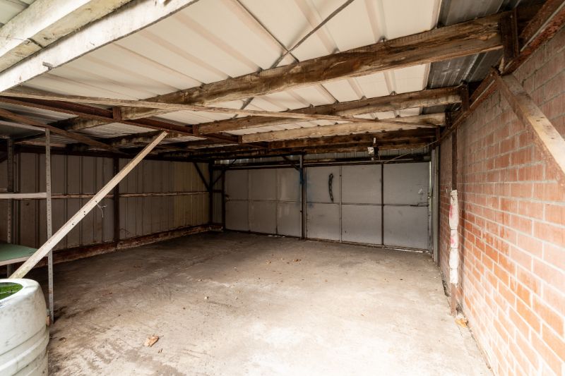 Ruime en veelzijdige rijwoning met garage achteraan en aparte ingang foto 22