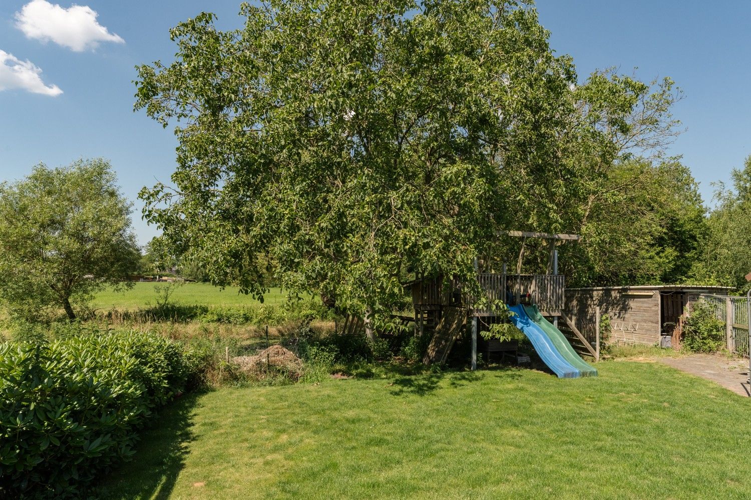 Ruime gezinswoning met 5 SLK met prachtig groen uitzicht foto 31