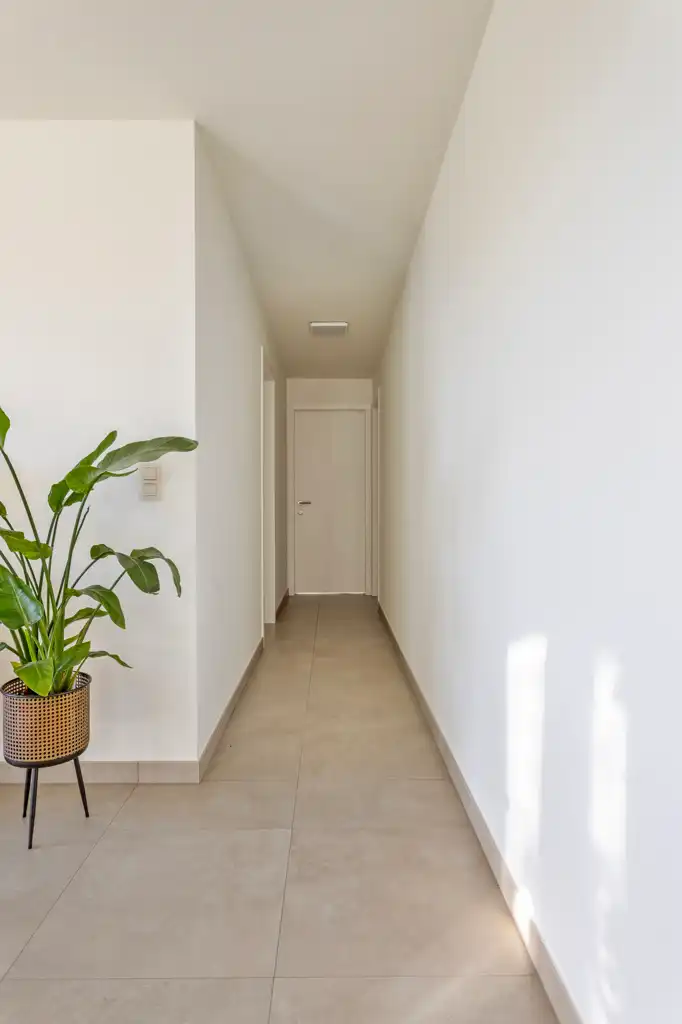 Penthouse in uitstekende staat met 2 slpks en 2 carports foto 12