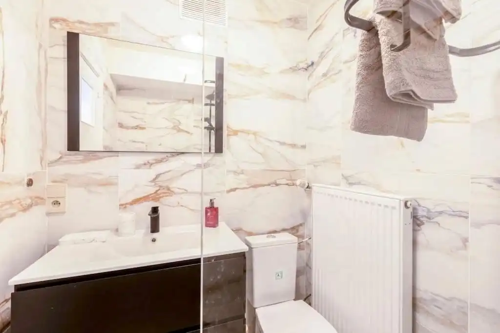 Stijlvol gerenoveerd 1-slaapkamerappartement aan het water in hartje Gent foto 10