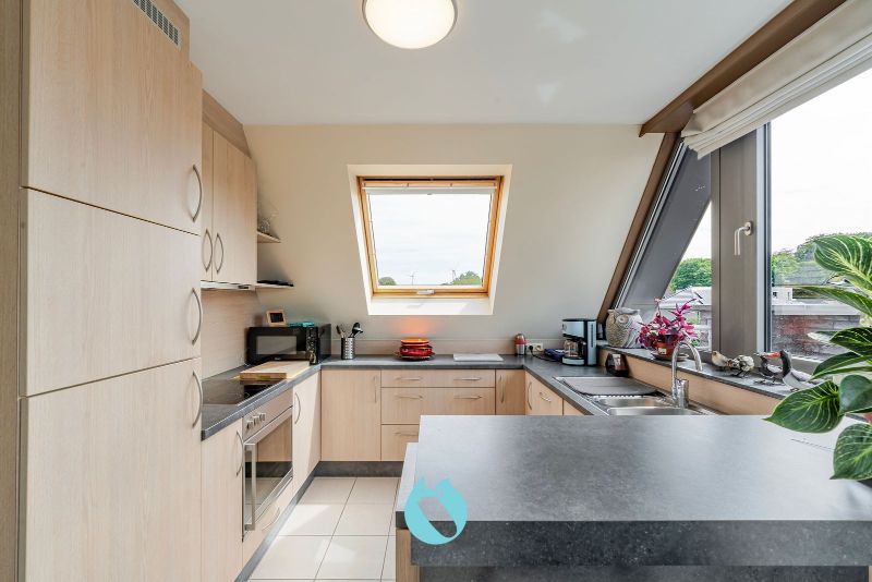 Dit prachtig en ruim appartement met één van de mooiste terrassen te Evergem is gelegen in de Kapellestraat foto 9