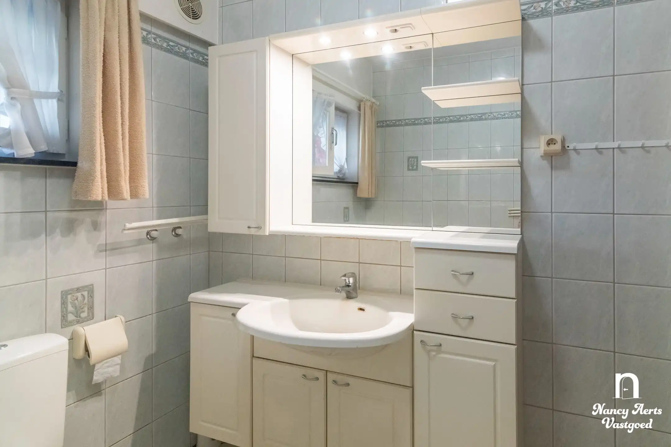 Karaktervolle woning met groene tuin in een rustige straat foto 20