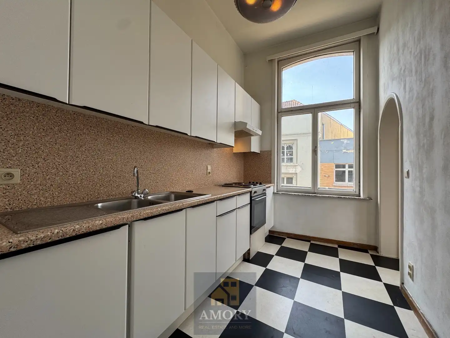 Lichtrijk hoekappartement met balkon op toplocatie Nederkouter foto 9