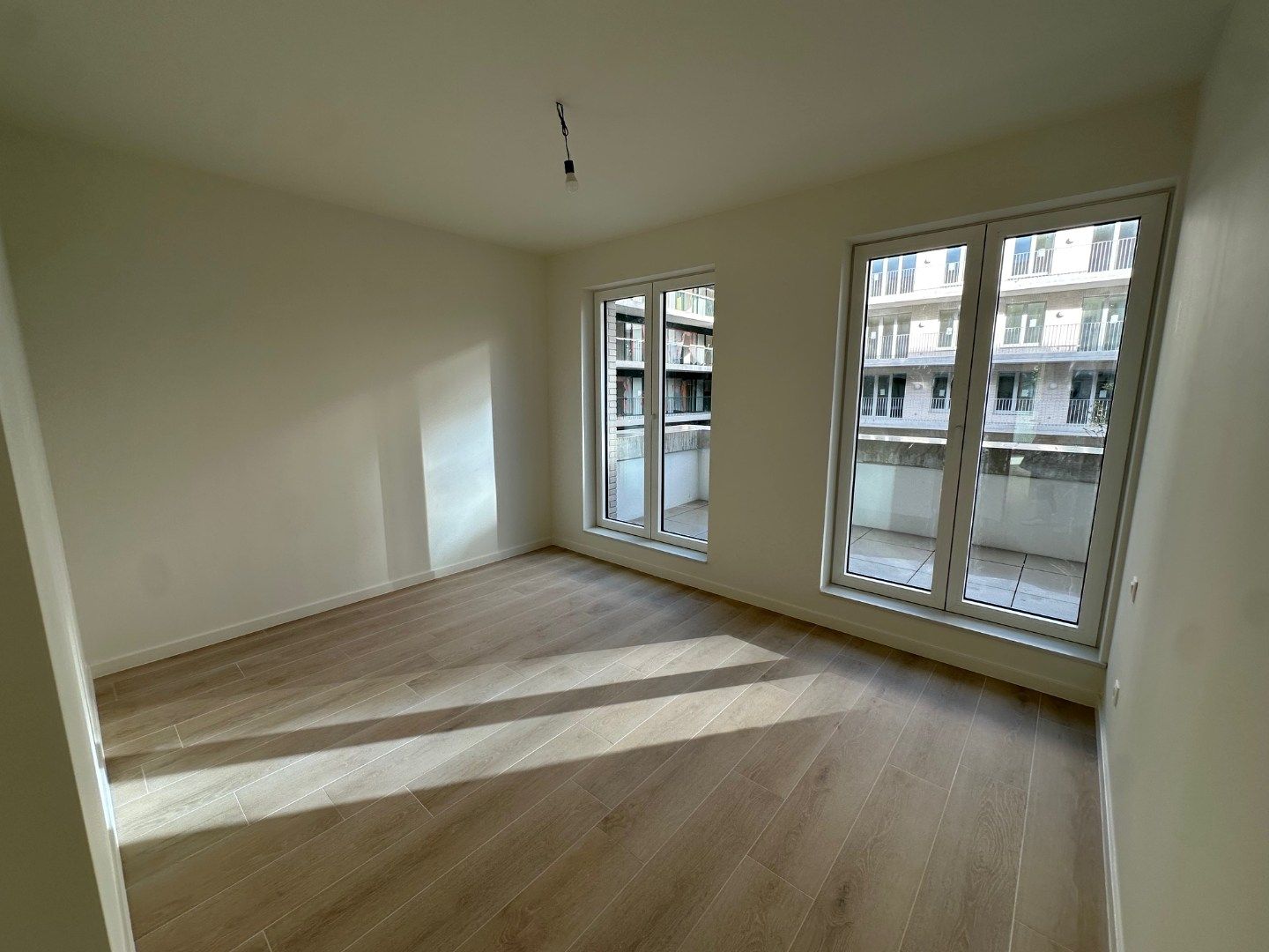 Prachtig nieuwbouwappartement met 2 slk, 2 terrassen en parking foto 13