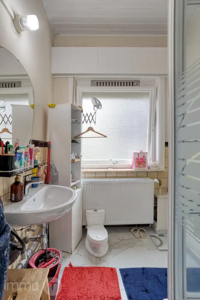 OPBRENGSTEIGENDOM MET 3 RUIME APPARTEMENTEN OP TOPLOCATIE AAN DE TIENSEPOORT foto 36
