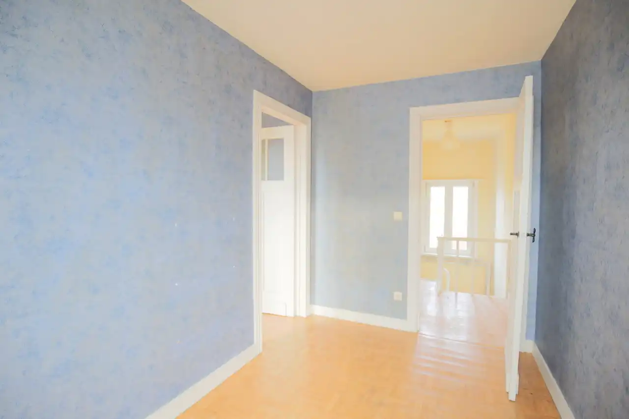 Rijwoning met terras en tuin foto 16