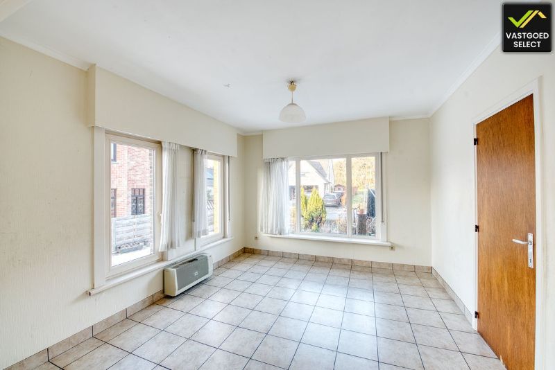 Te renoveren woning met tuin en garage in Sint-Laureins foto 3