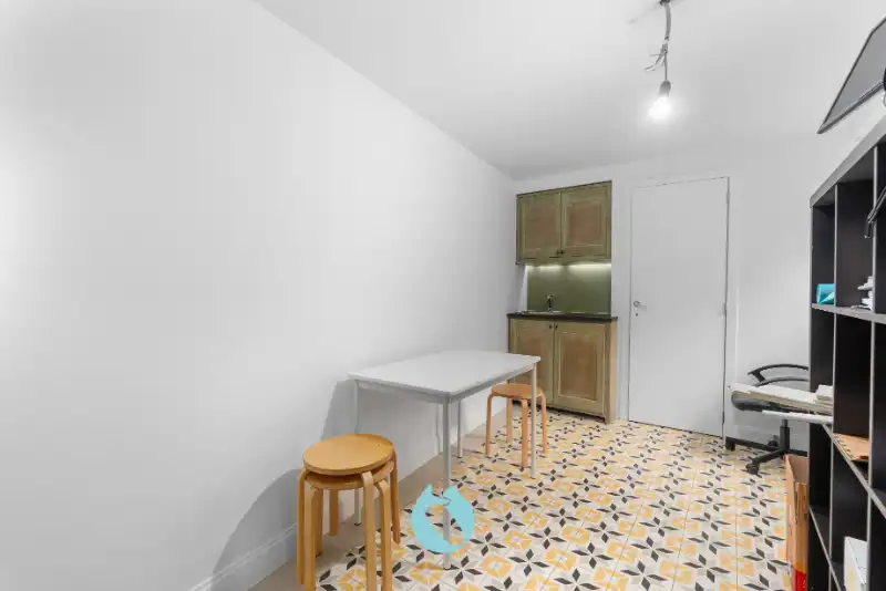 Instapklare stadswoning met 2 slaapkamers, bureauruimte en tuin foto 4