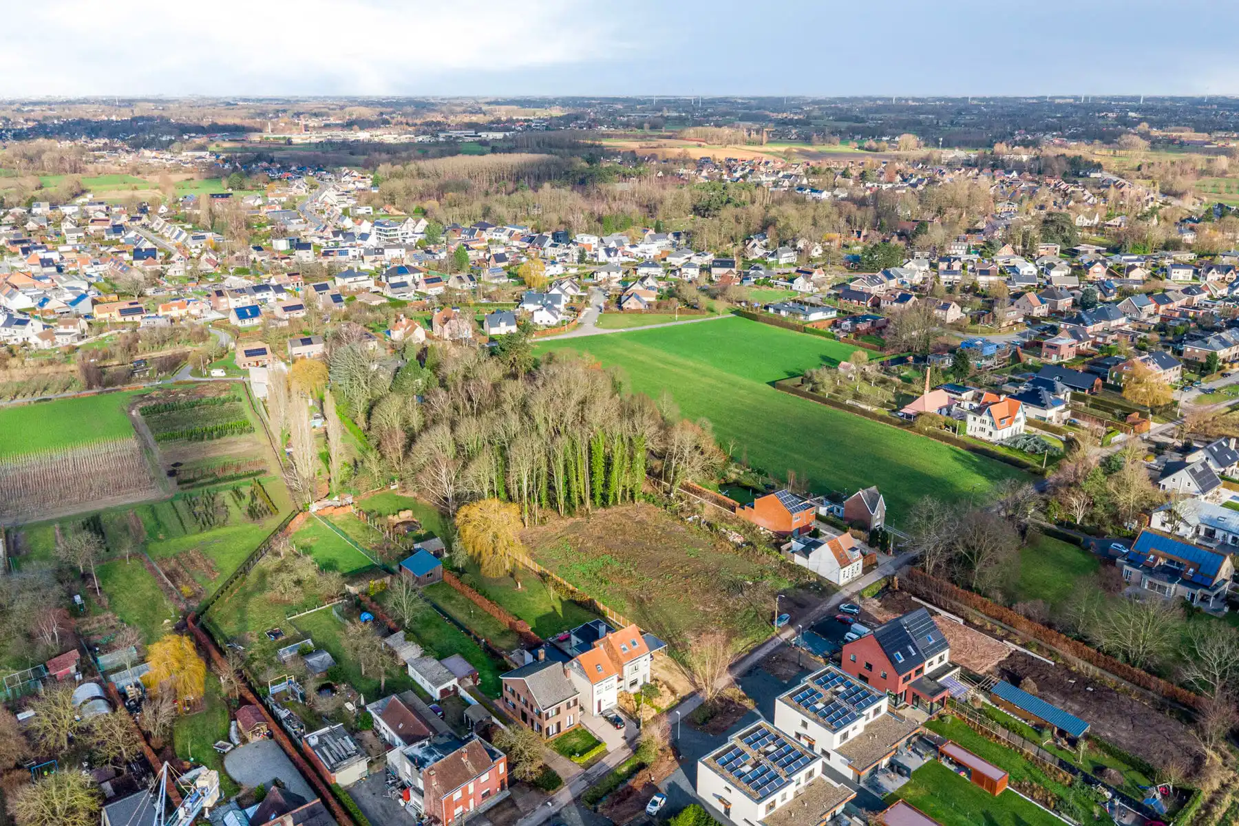 TE KOOP - bouwgrond halfopen bebouwing met stuk bos op 1276m² foto 2