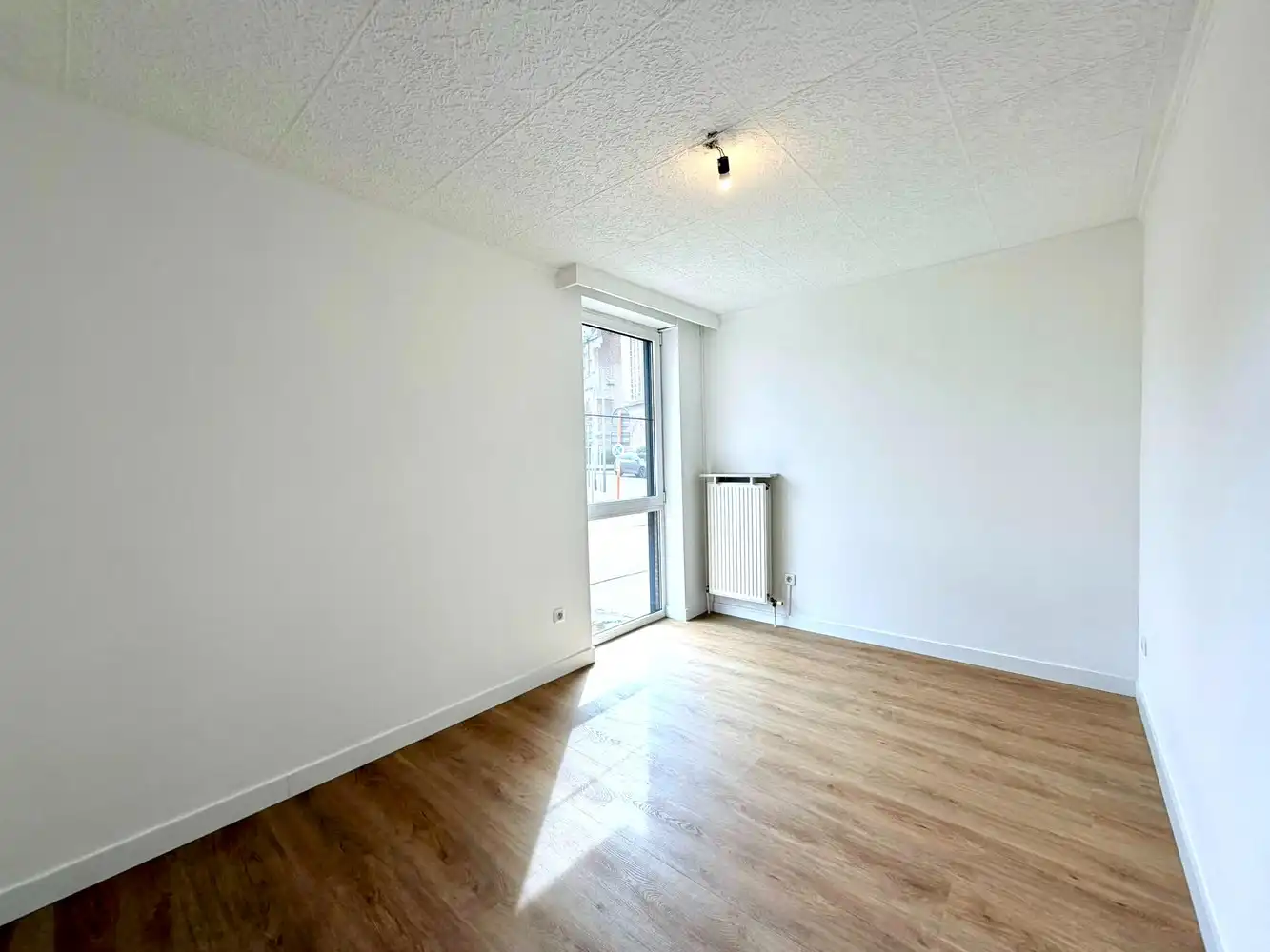 Gelijkvloers appartement met 2 slaapkamers en parking te huur in het centrum van Lanaken foto 13