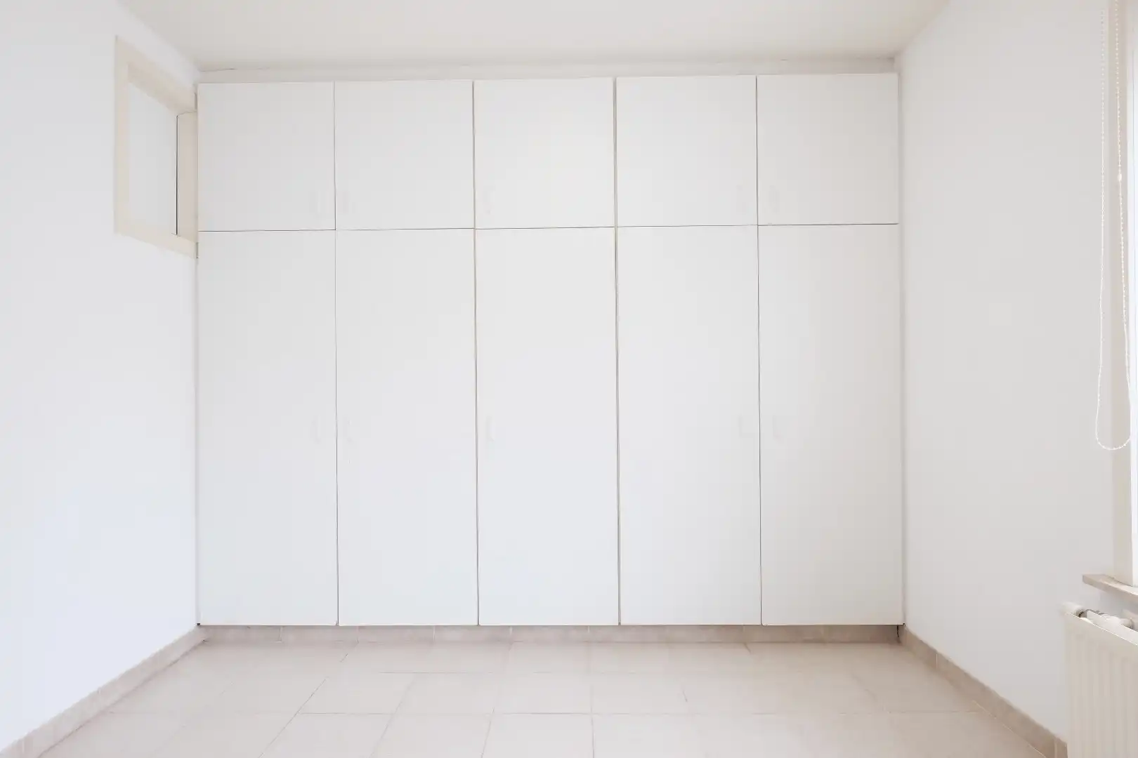 Centraal gelegen gelijkvloers 2-slaapkamerappartement — ideaal als starter of opbrengsteigendom foto 12