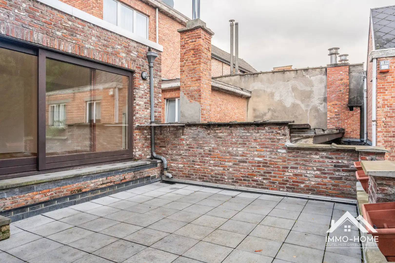Instapklare duplex met ruim terras in hartje Lokeren foto 9