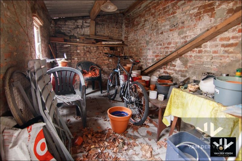 Verzorgde rijwoning met stadstuin aan Hasseltse stadsrand foto 23