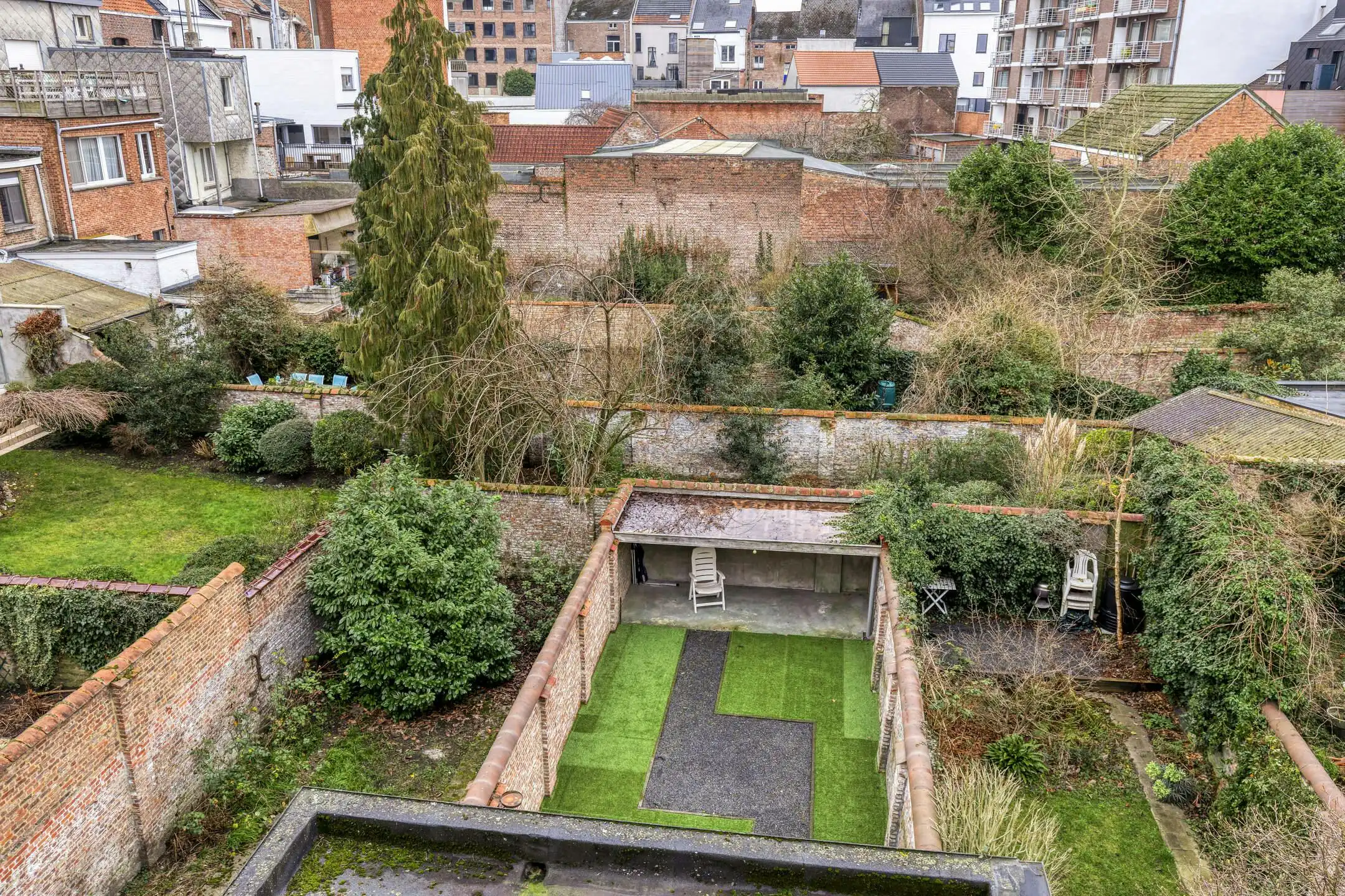 Opbrengsteigendom met 3 studio's en tuin te Mechelen foto 17