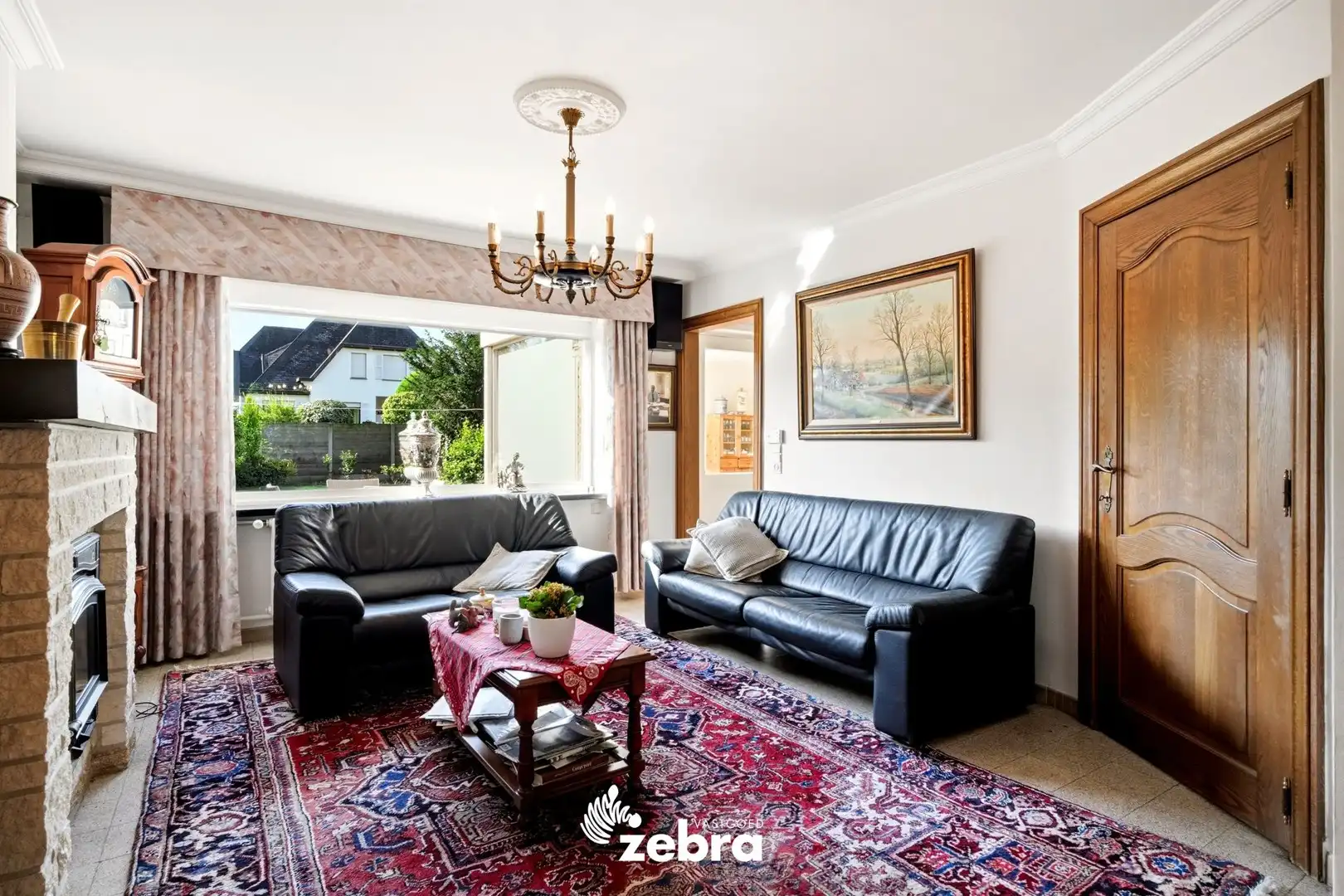 Ruime gezinswoning met 3 slaapkamers, ingerichte zolder, garage en tuin! foto 3