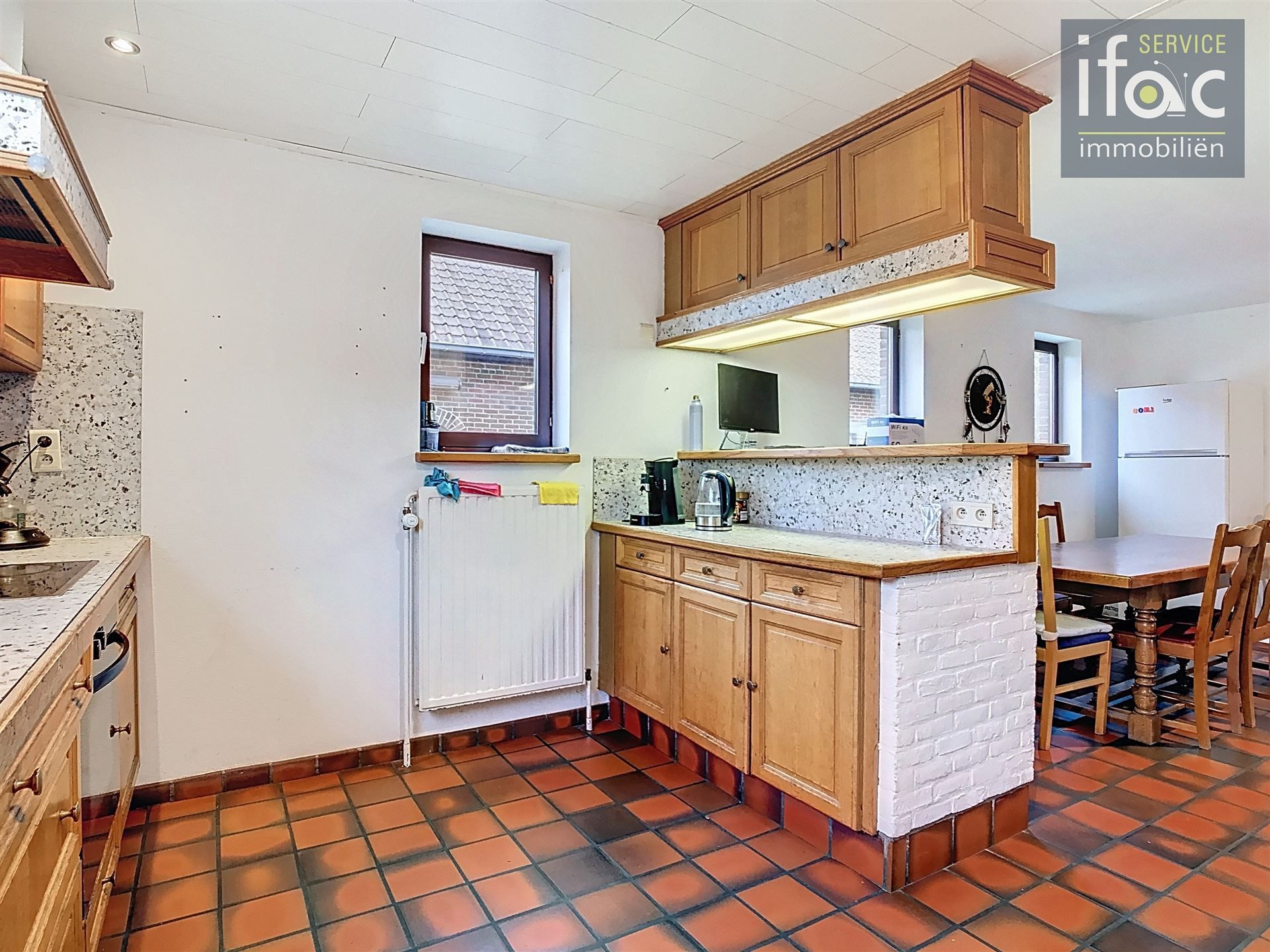 Huis met 4 slpks, 2 badk., tuin en garage foto 7