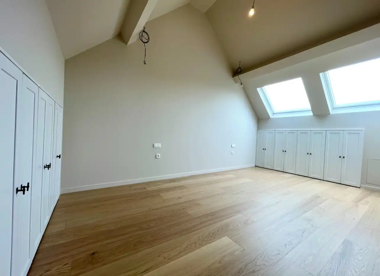 Smaakvol gerenoveerde woning met stadstuin foto 27