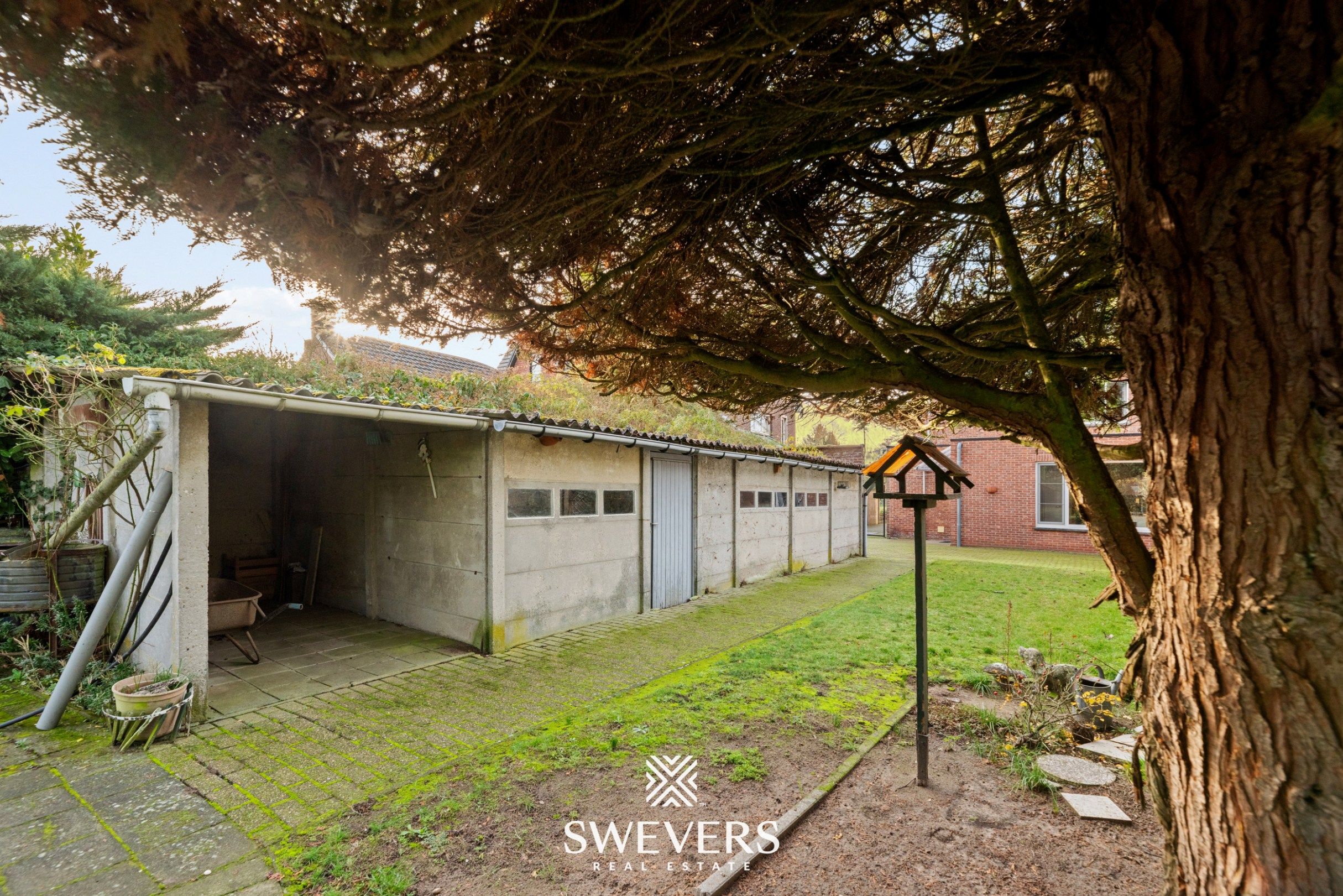 Woning met uitzonderlijk renovatiepotentieel op ruim en groen perceel nabij Zonhoven centrum foto 29