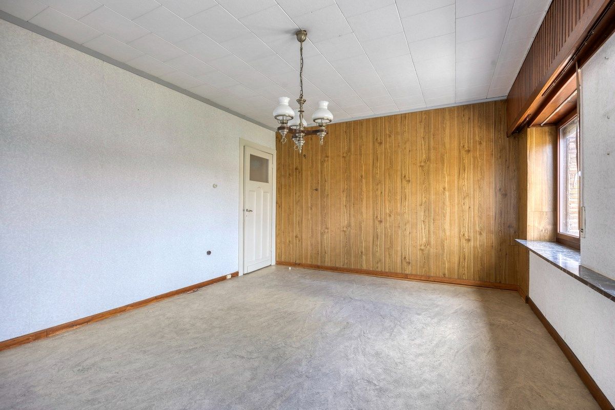 Ruim ingedeelde woning met 3slpks op een gunstige ligging. foto 16