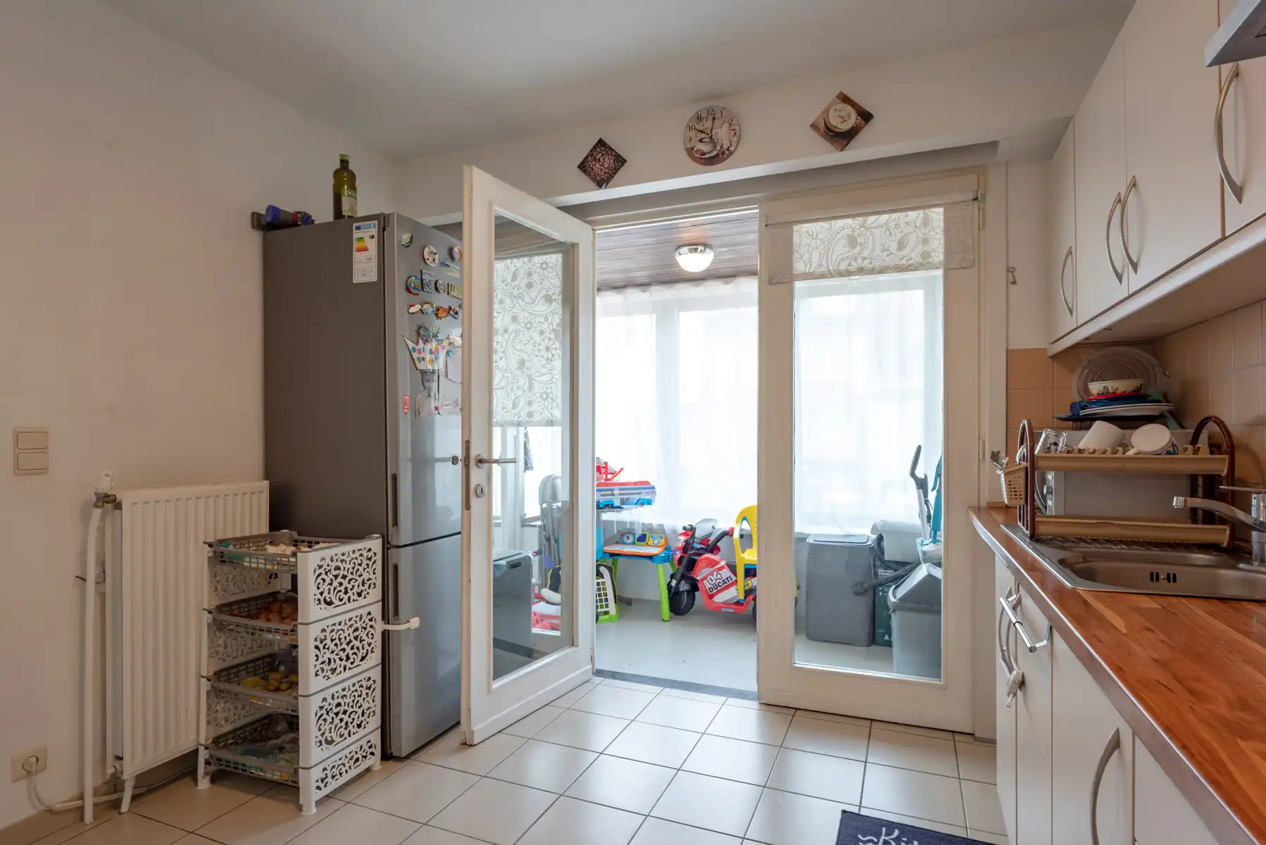 Goed gelegen appt met terras, kelder en parking voor de deur foto 7