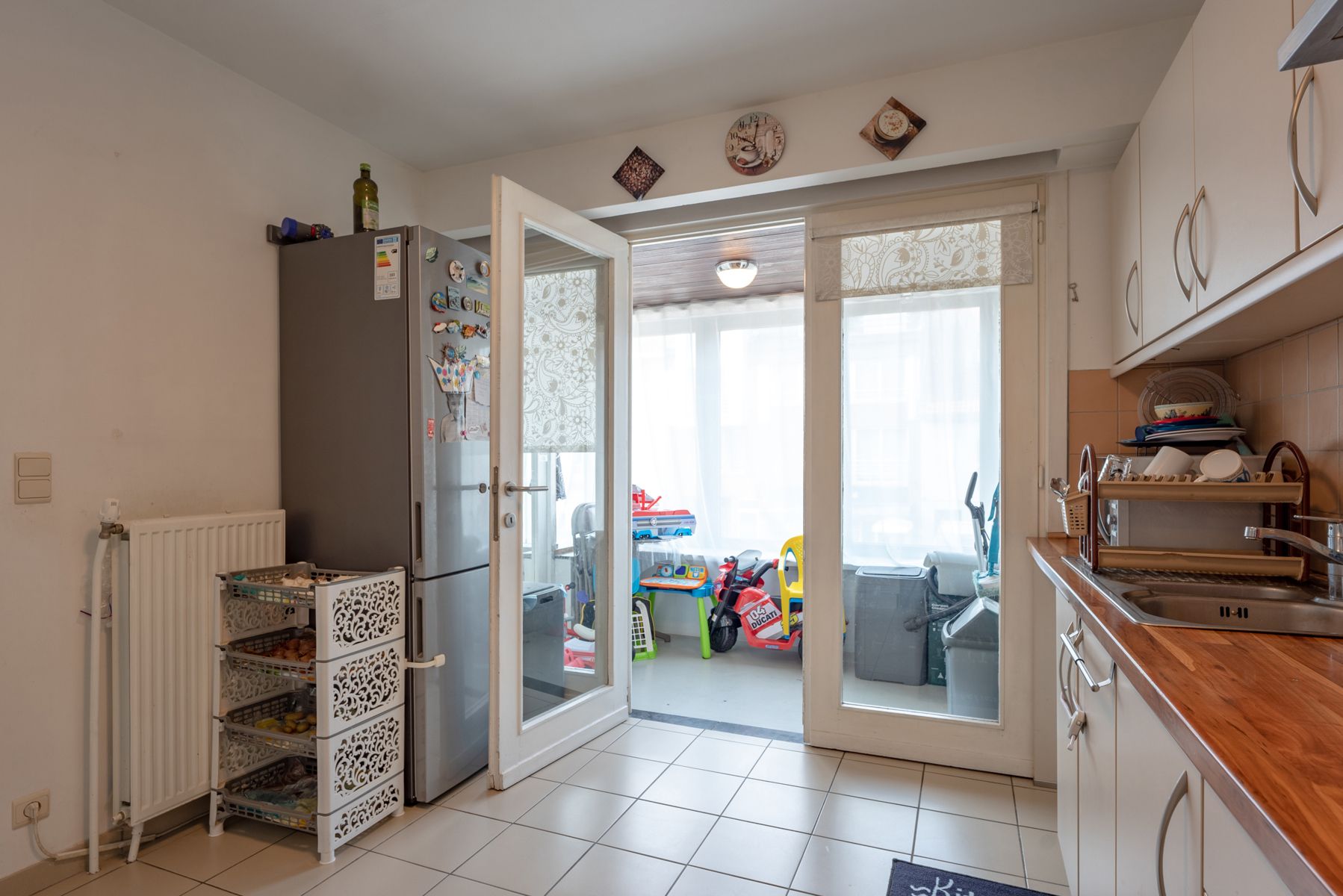 Goed gelegen appt met terras, kelder en parking voor de deur foto 7