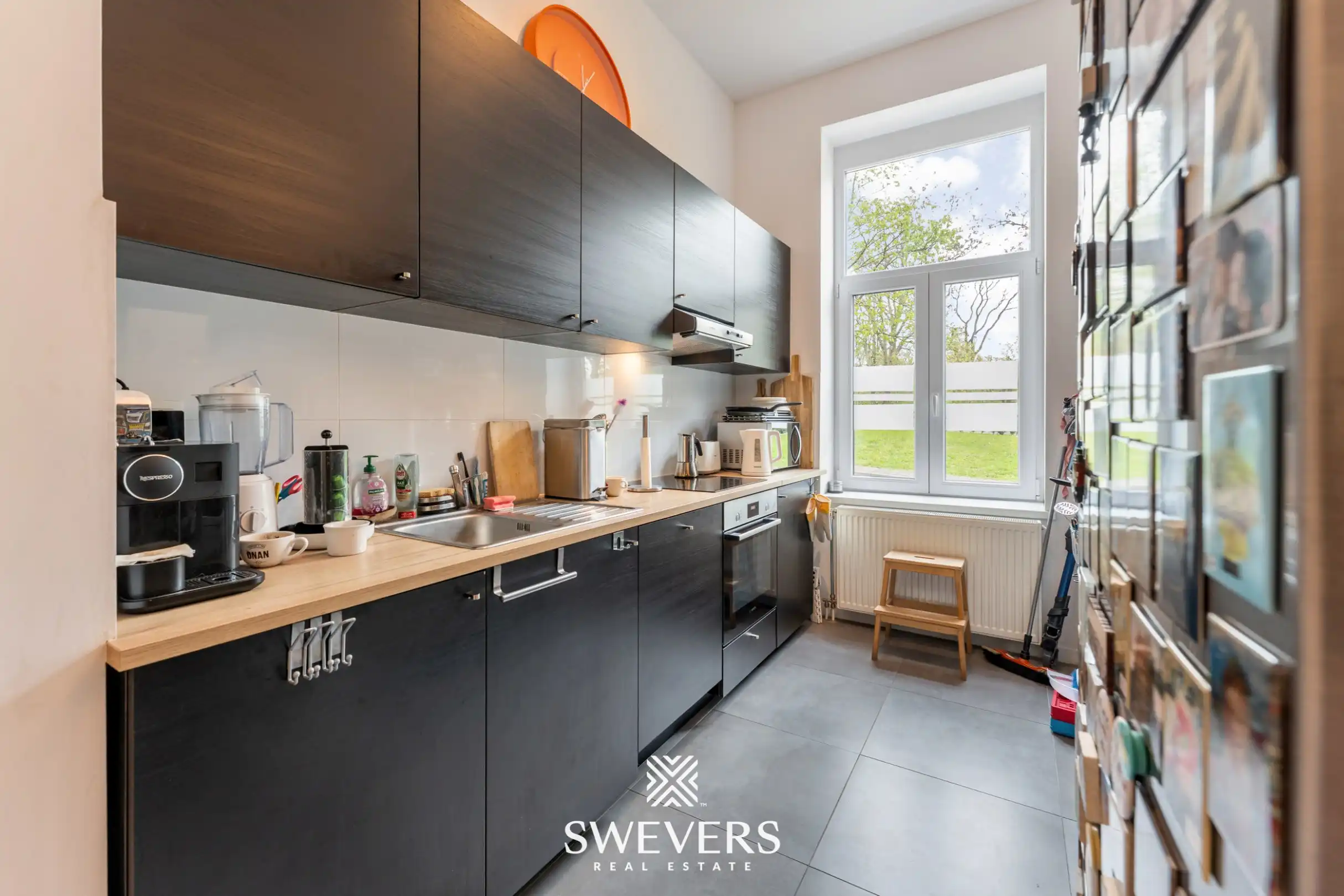 Instapklare stadswoning met zonnige tuin op toplocatie nabij centrum Leuven foto 7