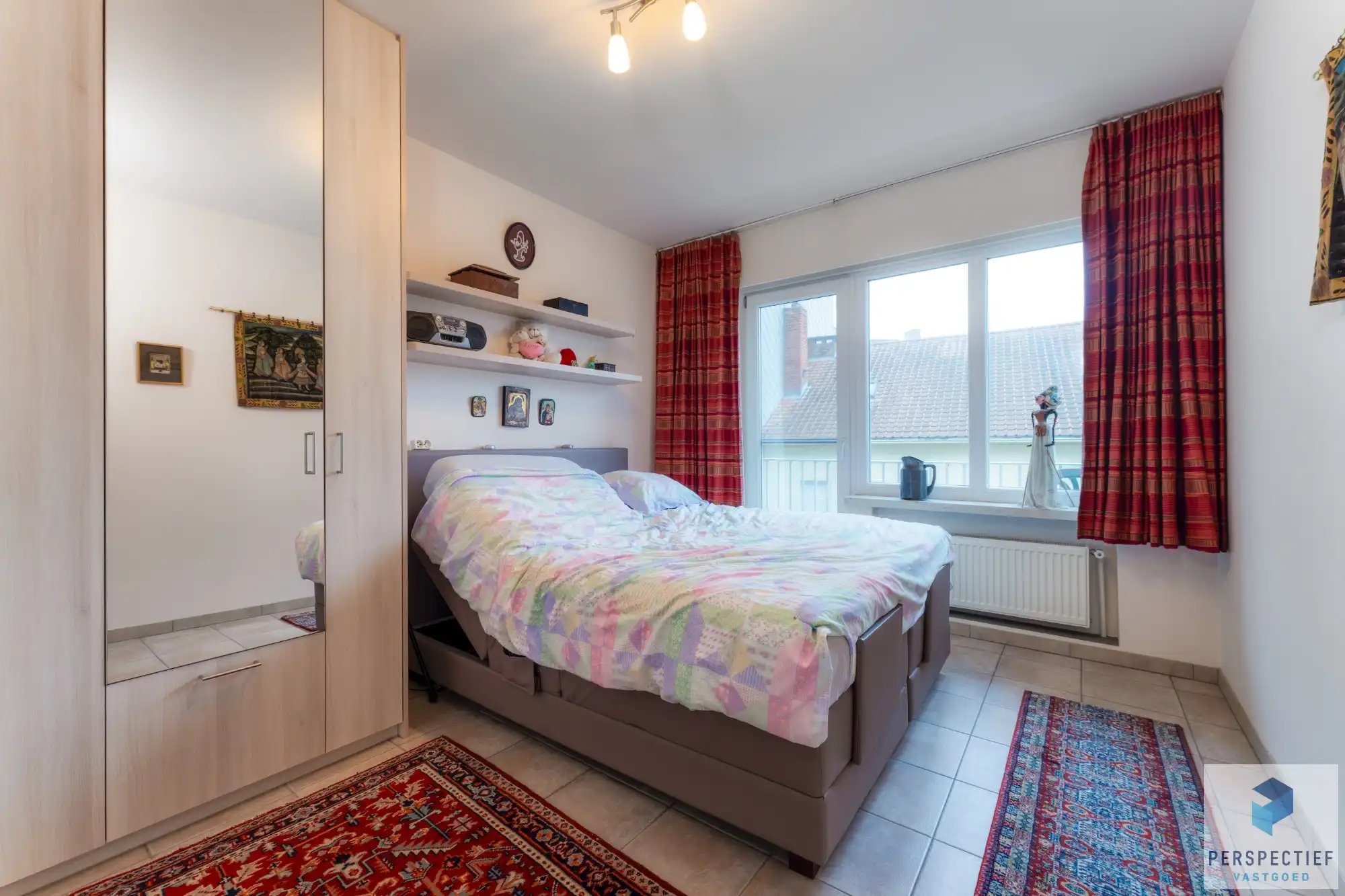 Goed gelegen ruim vernieuwd 2 slaapkamer appartement met grote berging en autostaanplaats foto 12